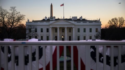 The sun sets over the White House on the final night of Trump's presidency.
