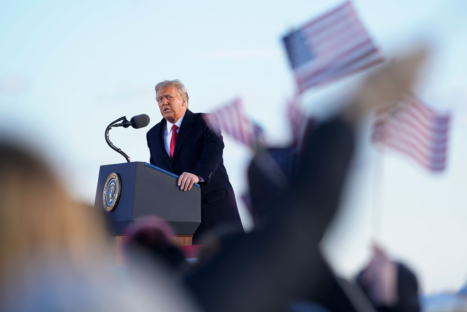 Trump gives a farewell speech before boarding Air Force One at Joint Base Andrews. "I will always fight for you,"<a href="index.php?page=&url=https%3A%2F%2Fwww.cnn.com%2Fpolitics%2Flive-news%2Fbiden-harris-inauguration-day-2021%2Fh_c7d52b0352ef4bfed902fd3b12d8a24b" target="_blank"> he said in front of a crowd of family and friends.</a> "I will be watching. I will be listening, and I will tell you that the future of this country has never been better. I wish the new administration great luck and great success. I think they'll have great success. They have the foundation to do something really spectacular."
