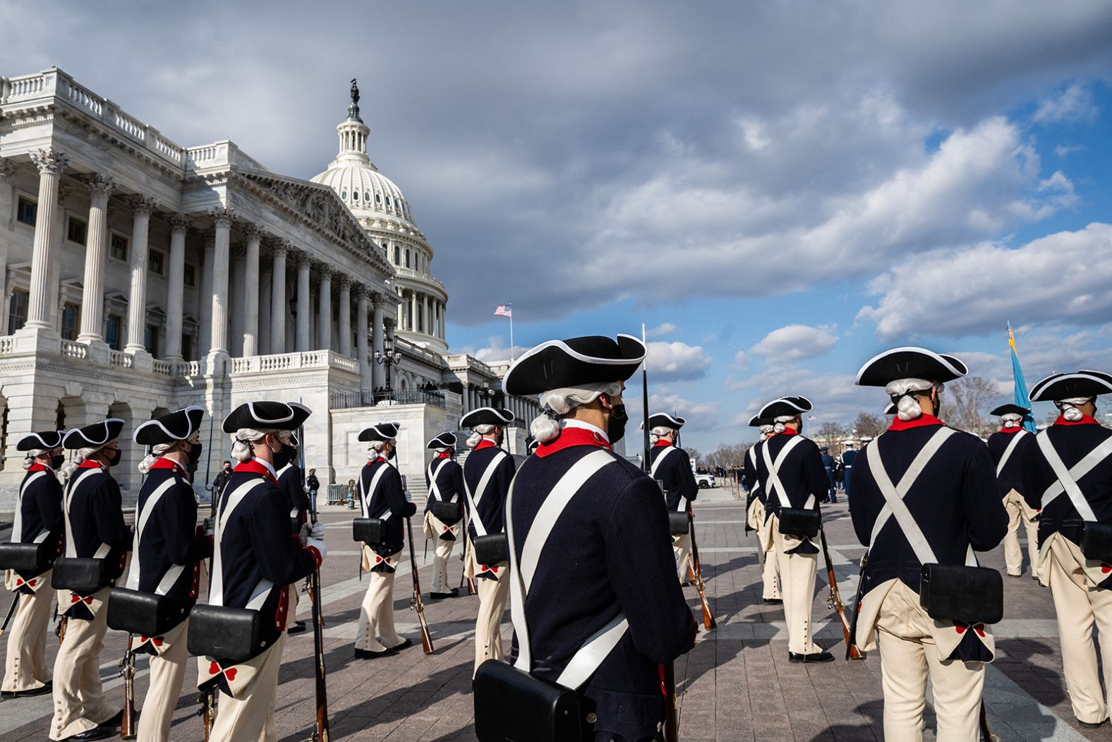 Historical military attire is worn for the "pass in review," a tradition where the incoming president reviews a procession of military troops.