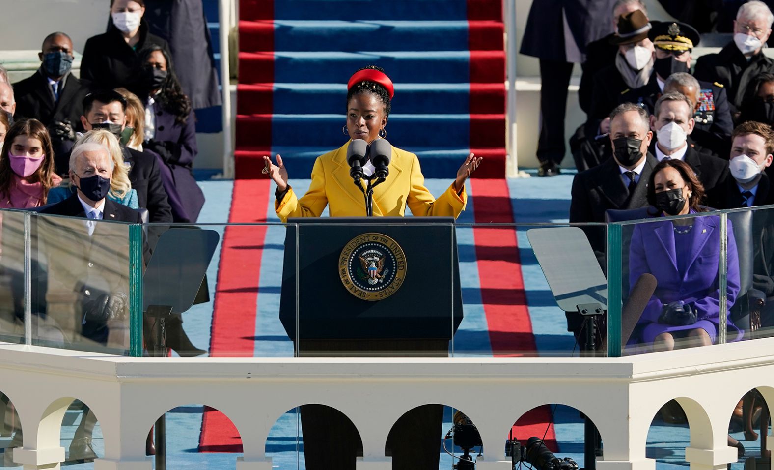 Amanda Gorman, the nation's first-ever youth poet laureate, <a href="index.php?page=&url=https%3A%2F%2Fwww.cnn.com%2Fpolitics%2Flive-news%2Fbiden-harris-inauguration-day-2021%2Fh_5818ddd1619fe02d7f3b2b30bdfaf331" target="_blank">delivered a message of resilience</a> at the inauguration. "We will not march back to what was, but move to what shall be: a country that is bruised but whole, benevolent but bold, fierce and free," she said. "We will not be turned around or interrupted by intimidation because we know our inaction and inertia will become the future."