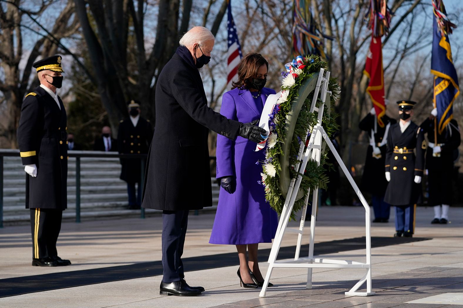 Biden and Harris participate in a wreath-laying ceremony at the Tomb of the Unknown Soldier in Arlington, Virginia