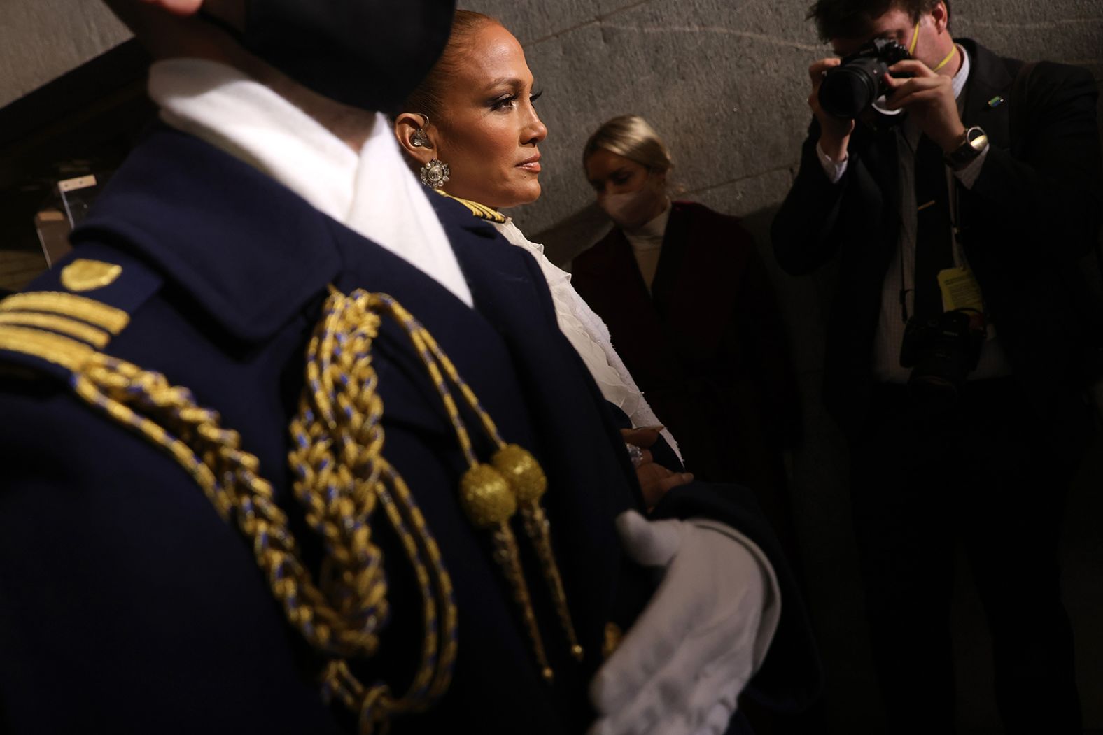 Lopez is escorted to the inauguration.