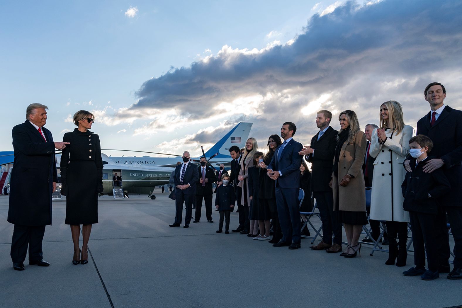 Trump acknowledges his children and other family members on the tarmac of Joint Base Andrews before heading to Florida and skipping <a href="index.php?page=&url=https%3A%2F%2Fwww.cnn.com%2F2021%2F01%2F19%2Fpolitics%2Fgallery%2Fjoe-biden-inauguration-photos%2Findex.html" target="_blank">the inauguration of Joe Biden.</a> "I will always fight for you," <a href="index.php?page=&url=https%3A%2F%2Fwww.cnn.com%2Fpolitics%2Flive-news%2Fbiden-harris-inauguration-day-2021%2Fh_c7d52b0352ef4bfed902fd3b12d8a24b" target="_blank">he said in front of a crowd of family and friends.</a> "I will be watching. I will be listening, and I will tell you that the future of this country has never been better. I wish the new administration great luck and great success. I think they'll have great success. They have the foundation to do something really spectacular."