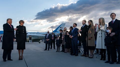 Trump acknowledges his children and other family members on the tarmac of Joint Base Andrews.