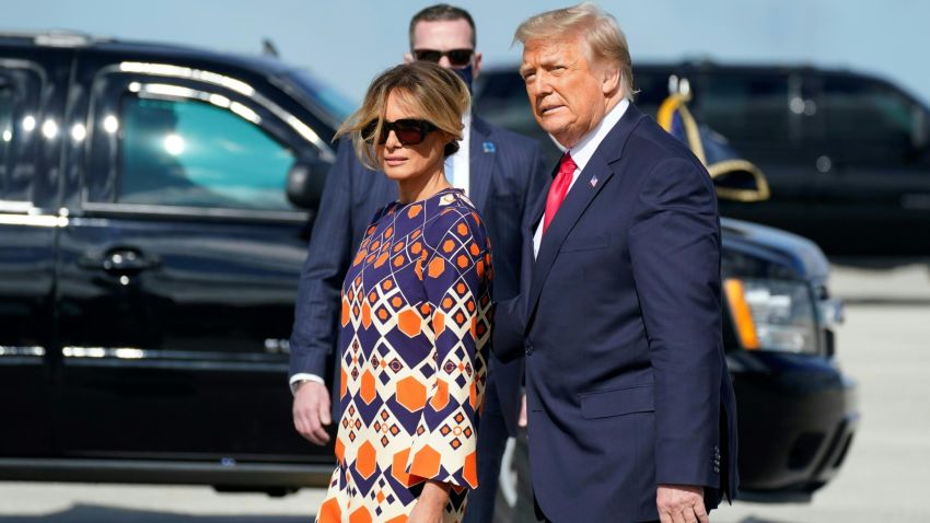Outgoing US President Donald Trump and First Lady Melania arrive at Palm Beach International Airport in West Palm Beach, Florida, on January 20, 2021. - President Trump and the First Lady travel to their Mar-a-Lago golf club residence in Palm Beach, Florida, and will not attend the inauguration for President-elect Joe Biden. (Photo by ALEX EDELMAN / AFP) (Photo by ALEX EDELMAN/AFP via Getty Images)