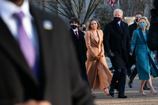 While traveling to the White House, Biden <a href="index.php?page=&url=https%3A%2F%2Fwww.cnn.com%2Fpolitics%2Flive-news%2Fbiden-harris-inauguration-day-2021%2Fh_eee3c39030d47d9b4df3c492d5840414" target="_blank">exited the presidential vehicle and walked the last stretch with his family.</a>