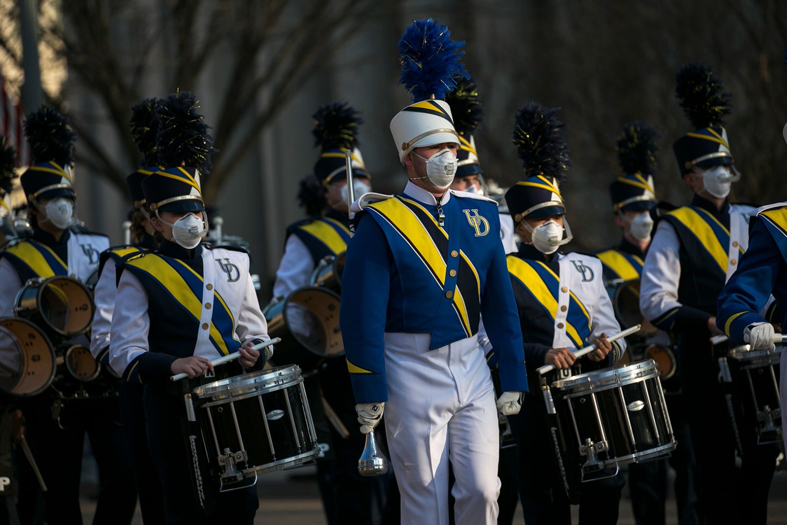 The drumline from the University of Delaware takes part in Biden's inaugural parade.