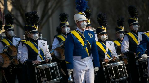 The drumline from the University of Delaware takes part in Biden's inaugural parade.