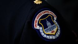 WASHINGTON, DC - MAY 9: A view of a U.S. Capitol Police badge on a uniform as officers wait for the start of an annual memorial service in honor of the four U.S. Capitol Police officers who have died in the line of duty, at the U.S. Capitol, May 9, 2016, in Washington, DC. Sgt. Clinton Holtz (2014), Detective John Gibson (1998), Officer Jacob Chestnut (1998) and Sgt. Christopher Eney (1984) are the four members of the U.S. Capitol Police who have lost their lives while on duty. (Photo by Drew Angerer/Getty Images)