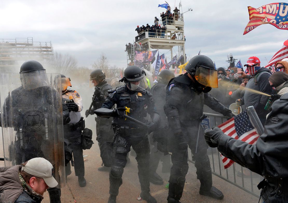 Trump supporters clash with police as they storm the Capitol. 