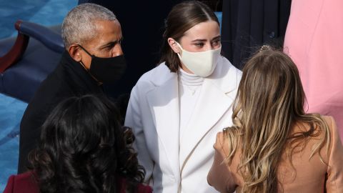 Naomi Biden and Finnegan Biden, granddaughters of US President-elect Joe Biden, speak with former US President Barack Obama and former First Lady Michelle Obama during US president Joe Biden's inauguration on the West Front of the US Capitol on January 20, 2021 in Washington, DC. Photo by Tasos Katopodis / POOL / AFP