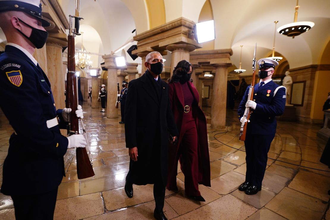 Barack and Michelle Obama arrive in the crypt of the US Capitol.