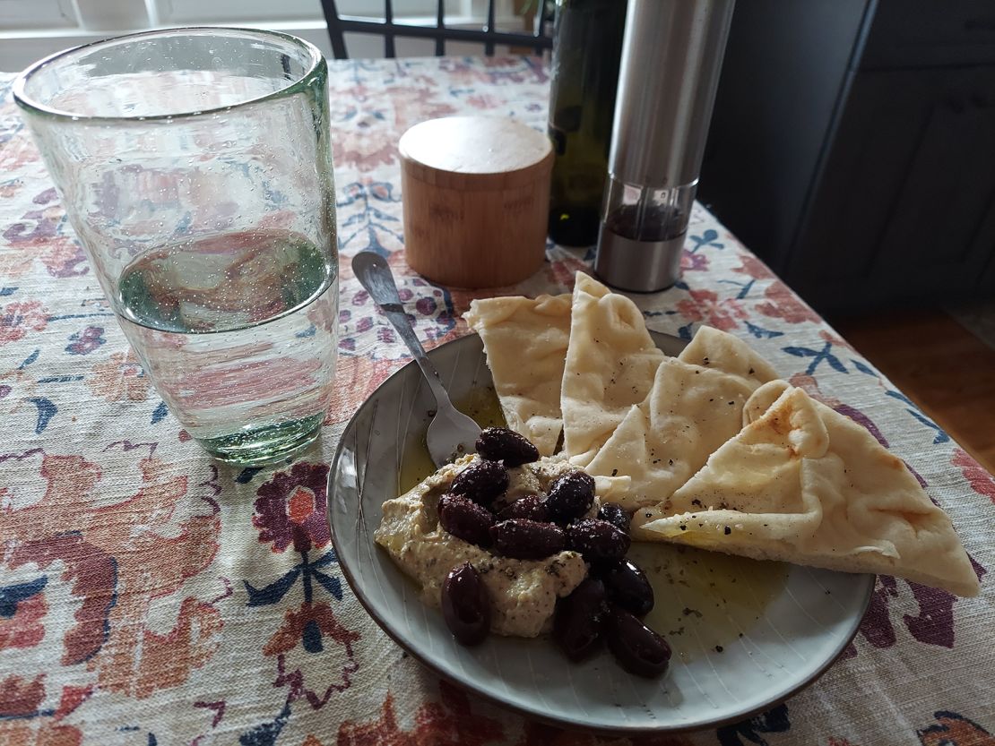 Althea Mullarkey's dinner routine includes lemon-dill hummus, olives and toasted naan with spicy oil.
