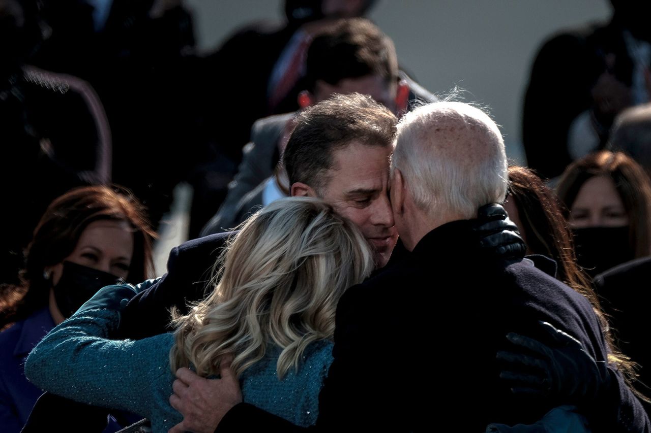 US President Joe Biden hugs his family at his inauguration on Wednesday, January 20.