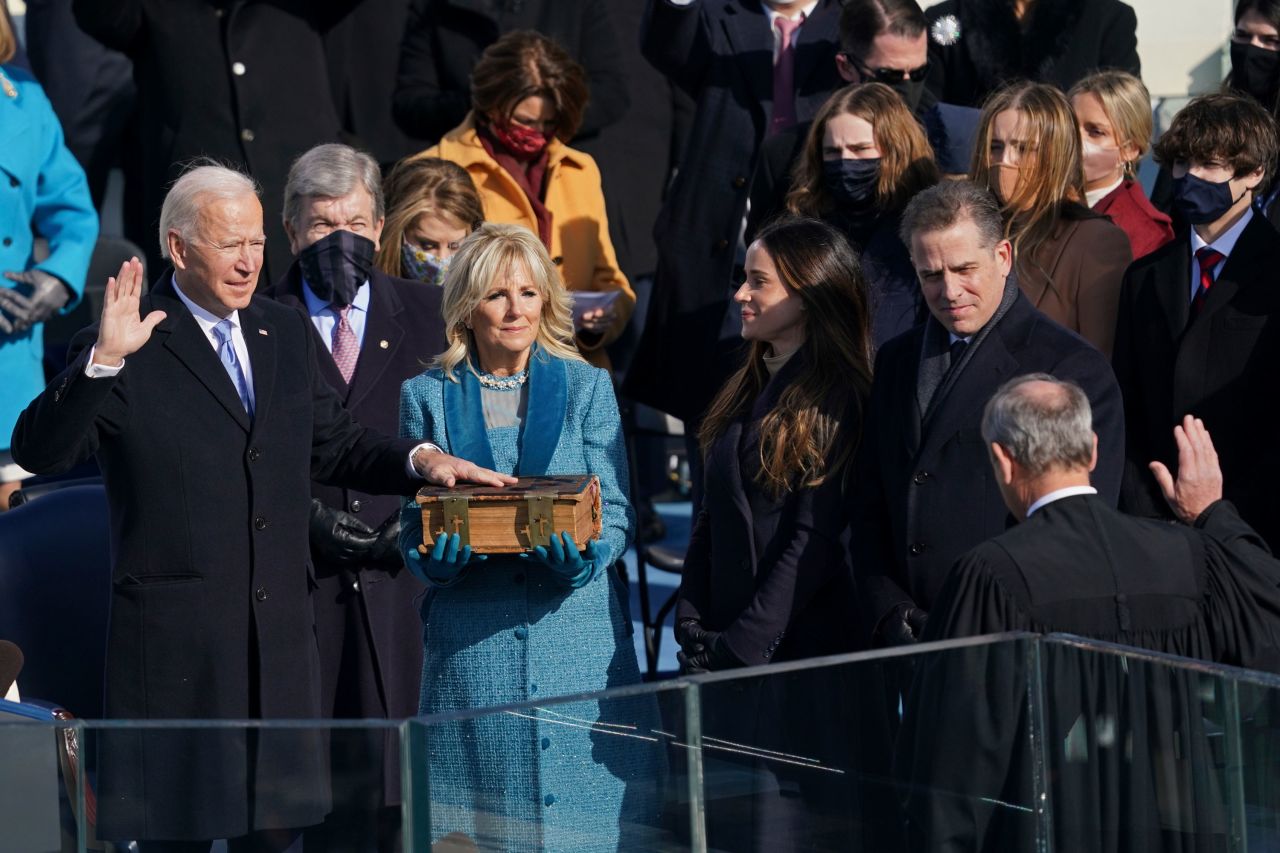 Joe Biden is <a href="https://www.cnn.com/2021/01/19/politics/gallery/joe-biden-inauguration-photos/index.html" target="_blank">sworn in as president of the United States</a> by Chief Justice John Roberts on Wednesday, January 20. Holding the Bible, <a href="https://www.cnn.com/2021/01/20/politics/biden-inauguration-family-bible/index.html" target="_blank">a family heirloom from the 19th century,</a> is Biden's wife, Jill. His children Ashley and Hunter are on the right.