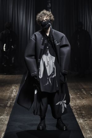 AW21/22 menswear collection by Yohji Yamamoto. Yamamoto plays with deconstructed and oversized shapes.