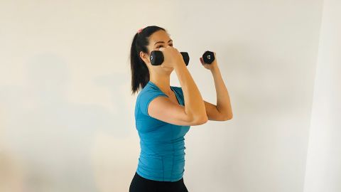 Avoid: Bringing the weights above your shoulders defeats the purpose of a bicep curl. 