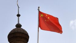 This photo taken on June 4, 2019 shows the Chinese flag flying over the Juma mosque in the restored old city area of Kashgar, in China's western Xinjiang region. - While Muslims around the world celebrated the end of Ramadan with early morning prayers and festivities this week, the recent destruction of dozens of mosques in Xinjiang highlights the increasing pressure Uighurs and other ethnic minorities face in the heavily-policed region. (Photo by GREG BAKER / AFP) / To go with AFP story China-politics-rights-religion-Xinjiang, FOCUS by Eva Xiao and Pak Yiu (Photo by GREG BAKER/AFP via Getty Images)