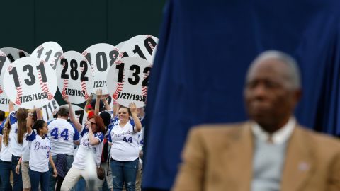 Fans hold up signs in the outfield with every home run hit by Aaron as he is honored on the 40th anniversary of his 715th on April 8, 2014, at Turner Field in Atlanta, Georgia. 