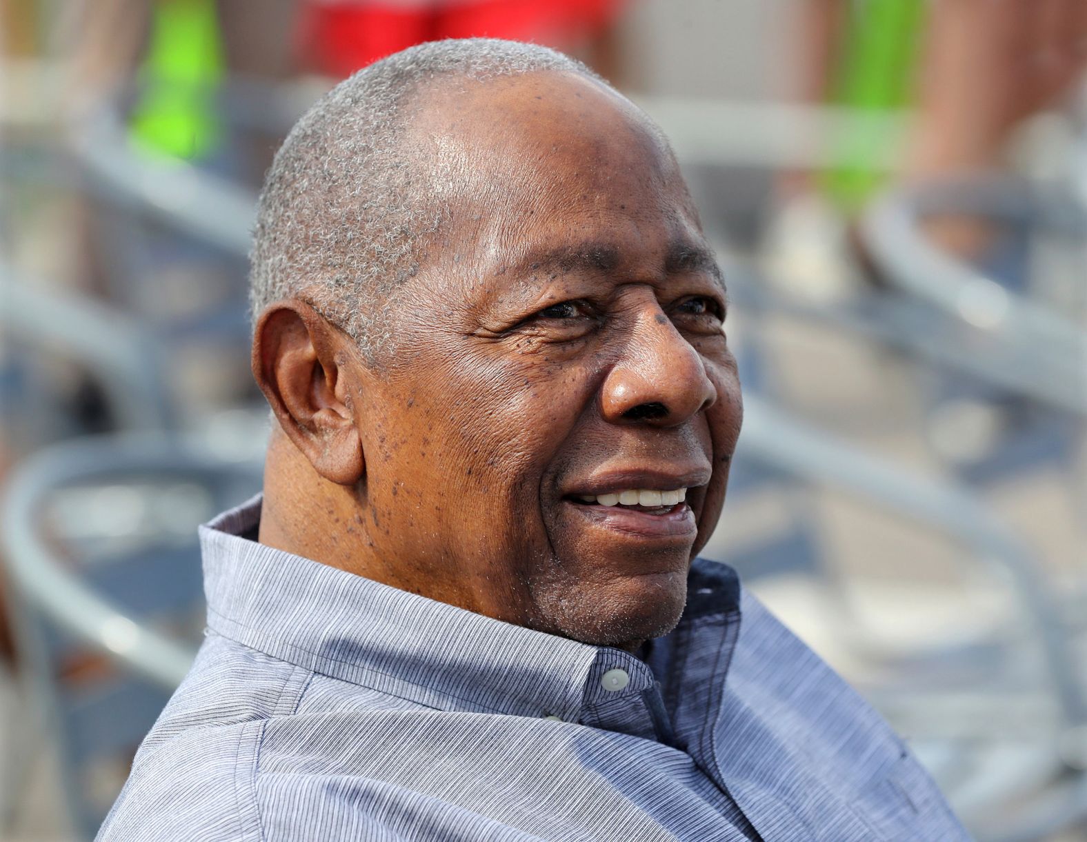 Aaron smiles in 2020 as he is honored with a street named after him outside the Braves' spring-training facility in Florida.