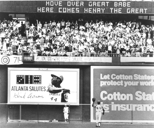 Aaron waves to Atlanta fans on the final day of the regular season in 1973. He ended the season with 713 home runs, one away from Babe Ruth's record.