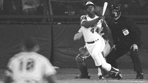 Aaron eyes the flight of the ball as he hit his record-breaking 715th home run on April 8, 1974. The historic moment happened in Atlanta against Los Angeles Dodgers pitcher Al Downing.