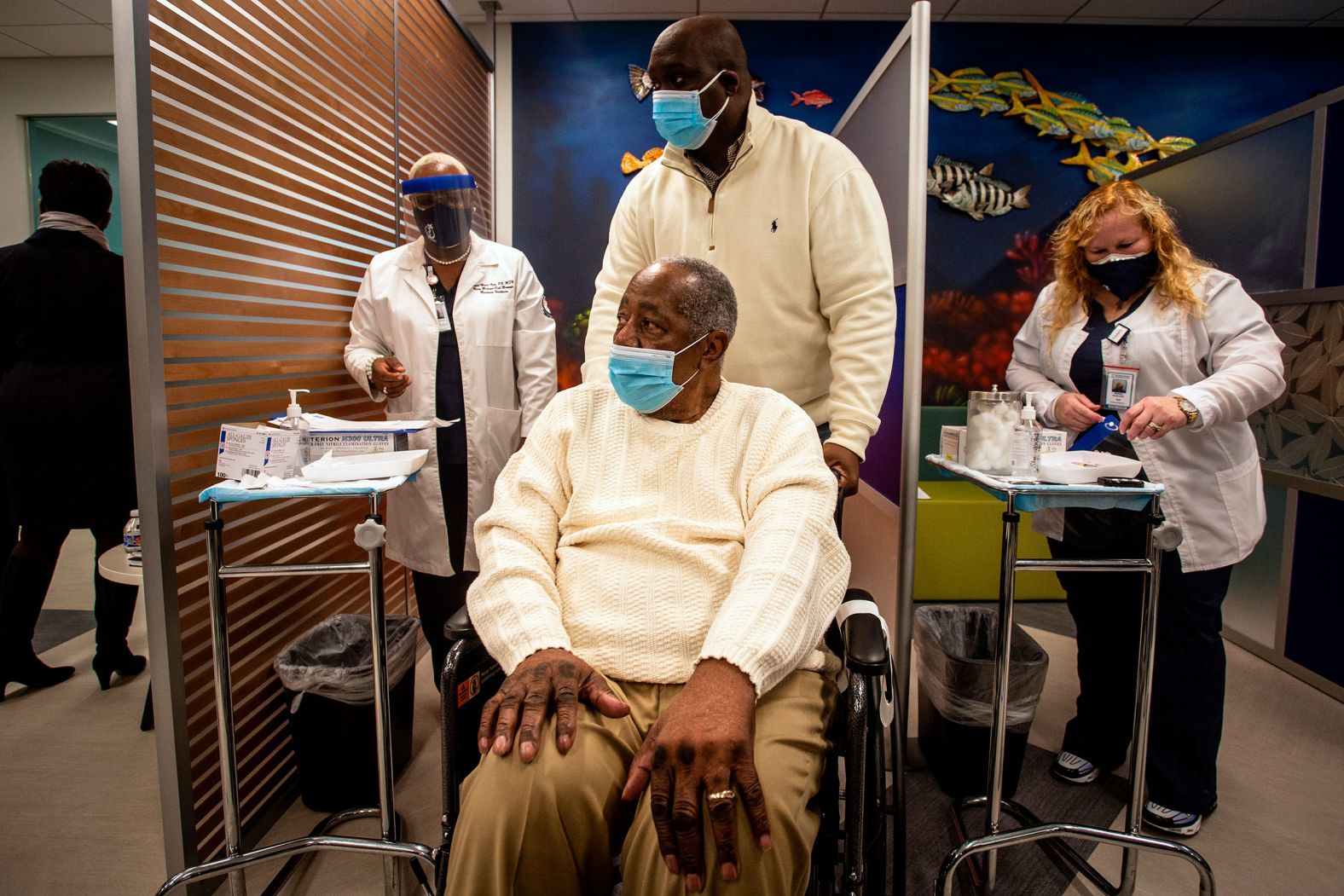 Aaron prepares to receive a Covid-19 vaccination in January 2021. Later that month <a  target="_blank" target="_blank">he died of natural causes</a>. He was 86.