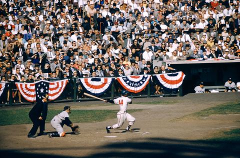 Aaron hits the ball during a World Series game in 1957. Aaron led the Braves in the Series with 11 hits, includes three home runs and a triple, and he drove in seven runs.