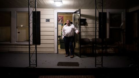 Pastor Jose Chicas stands in the doorway of the School for Conversion in Durham, North Carolina, in December 2018.