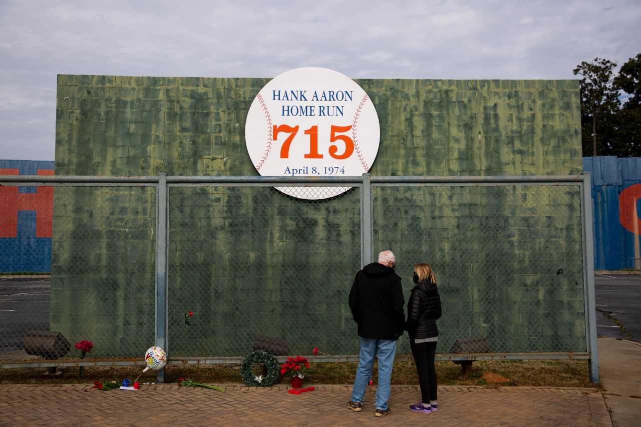 People in Atlanta pay respects to baseball legend Hank Aaron after he died on Friday, January 22.