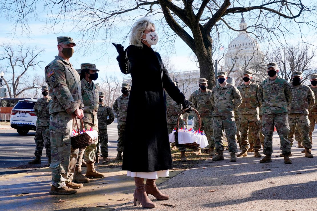 US First Lady Jill Biden surprises National Guard members outside the Capitol with chocolate chip cookies on January 22, 2021.