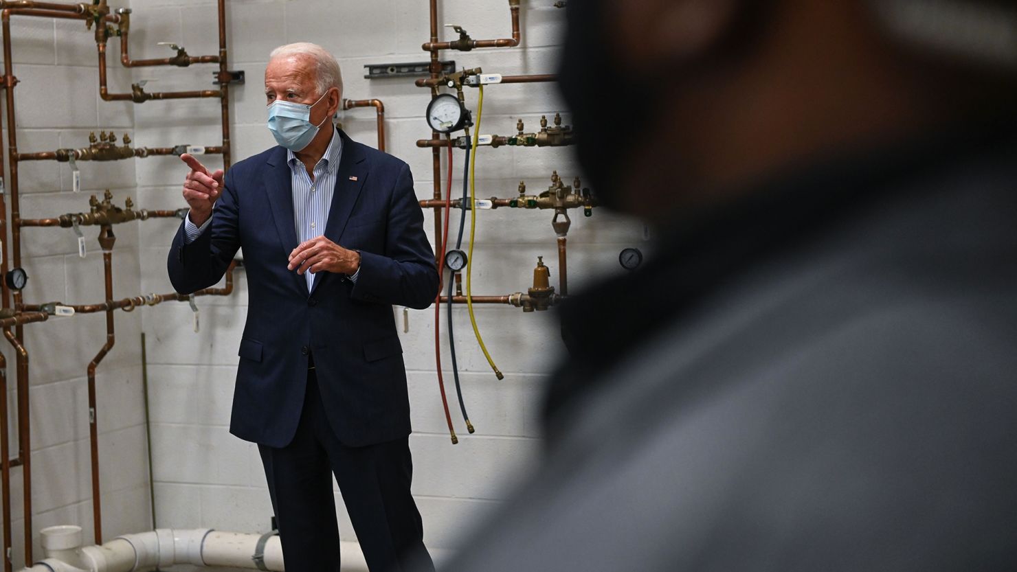 Democratic presidential nominee and former Vice President Joe Biden tours a local plumbers union training center in Erie, Pennsylvania on October 10, 2020. 