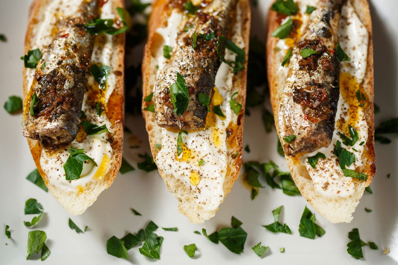 For a salmon alternative, why not try anchovy toasts with butter?