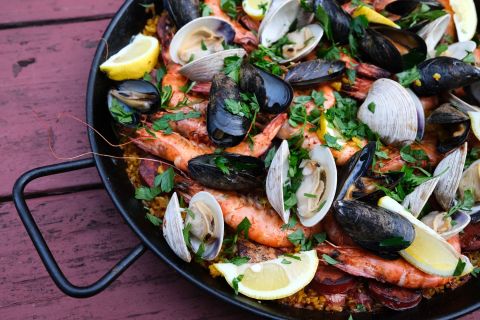 Paella with mussels and clams is a powerhouse dish that offers vitamin B12 to help you feel more even-keeled. 