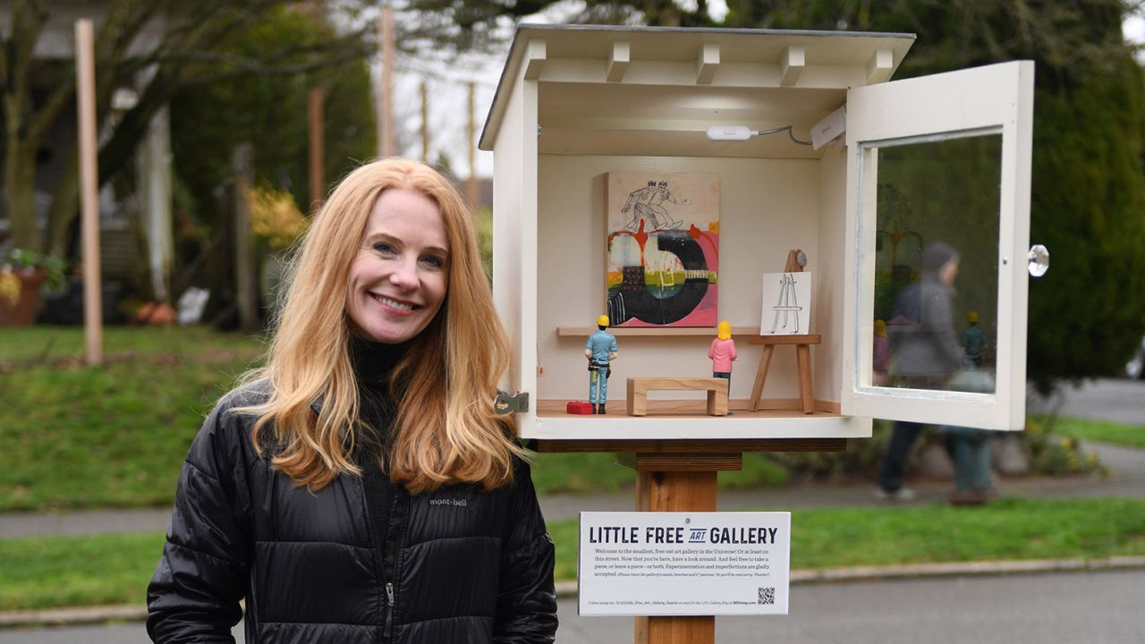 Stacy Milrany and her Little Free Art Gallery.