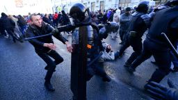 Demonstrators clash with riot police during a rally in support of jailed opposition leader Alexei Navalny in the far eastern city of Vladivostok on January 23, 2021. - Navalny, 44, was detained last Sunday upon returning to Moscow after five months in Germany recovering from a near-fatal poisoning with a nerve agent and later jailed for 30 days while awaiting trial for violating a suspended sentence he was handed in 2014. (Photo by Pavel KOROLYOV / AFP) (Photo by PAVEL KOROLYOV/AFP via Getty Images)