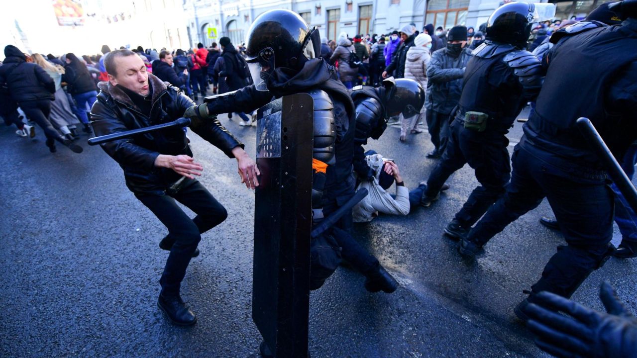 Demonstrators clash with riot police during a rally in Vladivostok on January 23, 2021.