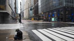 NEW YORK, NY - APRIL 24: A homeless person sits in the rain on April 24, 2020 in New York City. New York State Governor Andrew Cuomo, during his daily talk on Covid-19, stated that the number of deaths has dropped to its lowest total since April 1. COVID-19 has spread worldwide, causing more than 190,000 lives lost and more than 2.7 million reported infections. (Photo by Pablo Monsalve / VIEWpress via Getty Images)