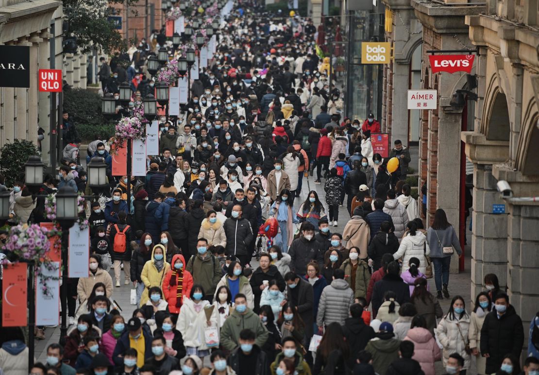 Crowds have returned to Wuhan's famous Jianghan shopping street, which was desserted this time last year.