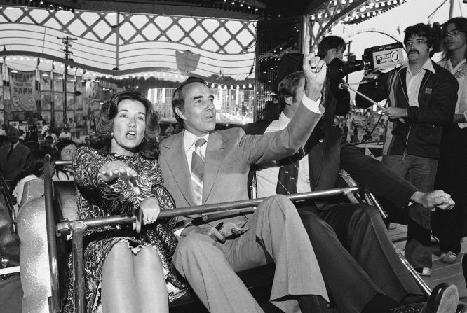 Dole and his wife, Elizabeth, enjoy a carnival ride at the Maryland State Fair in 1976.