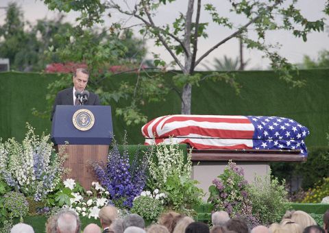 Dole delivers a eulogy at the funeral of former President Richard Nixon in 1994.