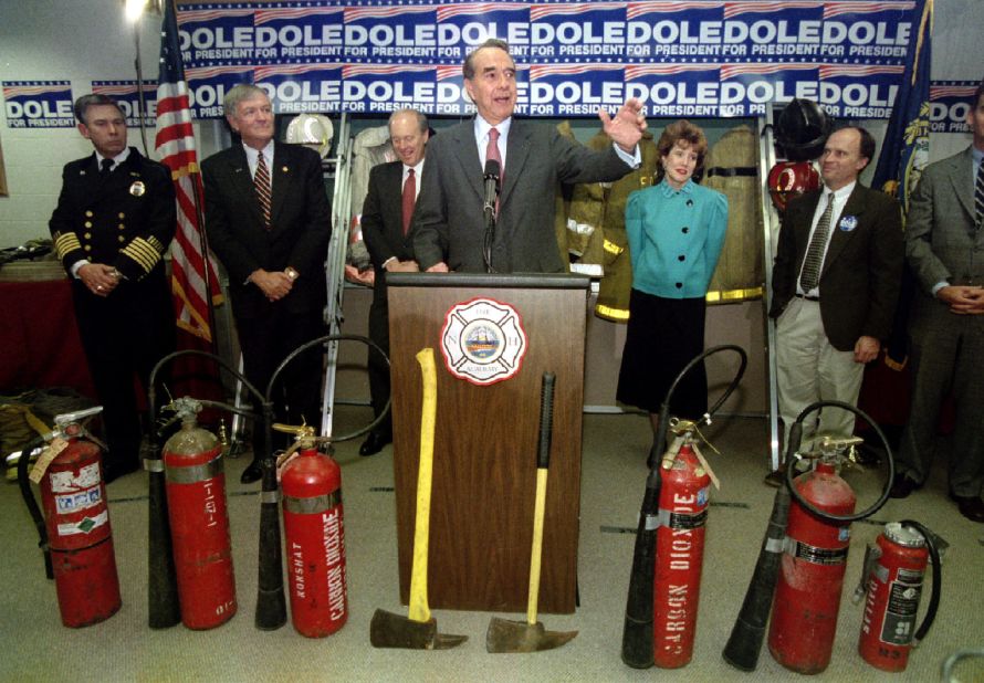 Dole, running for president once again, speaks to a crowd of firefighters and their families while on the campaign trail in 1996.