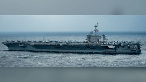 The aircraft carrier USS Theodore Roosevelt transits the Pacific Ocean January 15, 2021. The Roosevelt Carrier Strike Group deployed to the South China Sea over the weekend in a US commitment to freedom of the seas, the US Navy said.