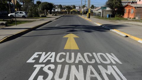 A warning sign painted on the street reading "Tsunami Evacuation" in La Serena, Coquimbo, Chile, taken on June 11, 2015.