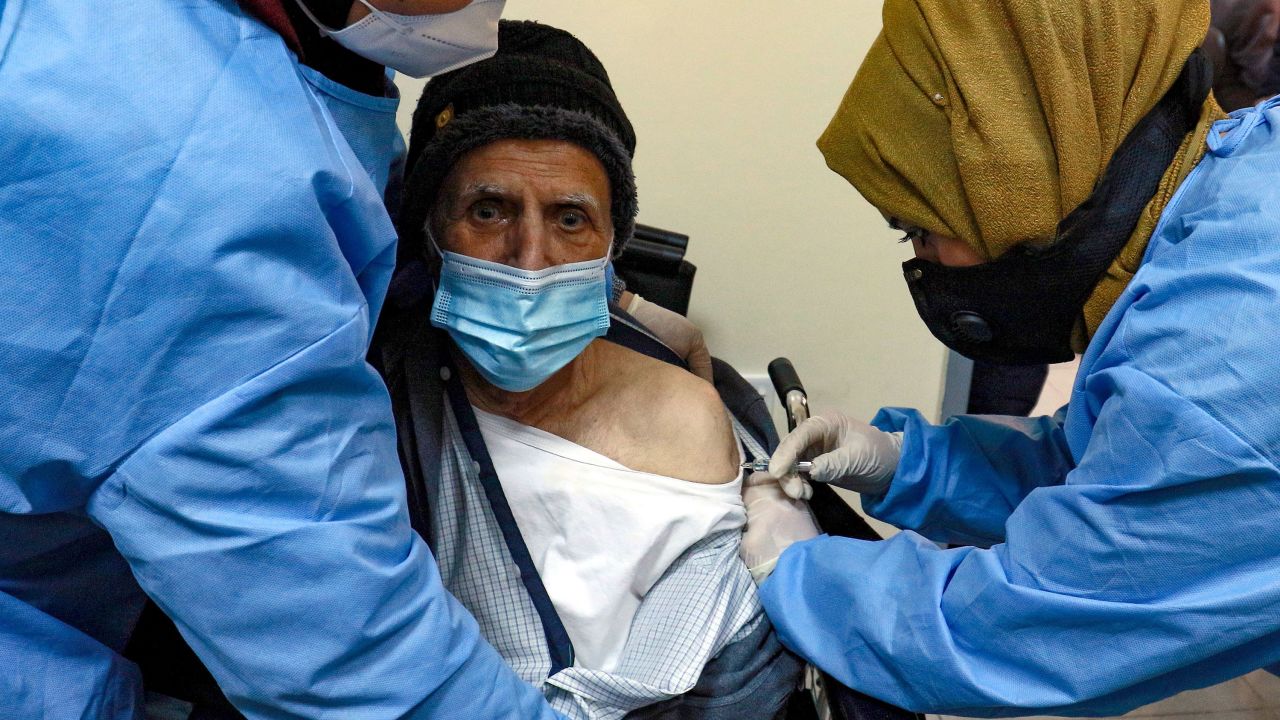 An elderly man receives a dose of the Sinopharm vaccine in Amman, Jordan, in January.