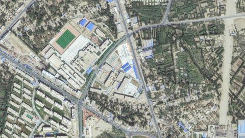 Maxar satellite imagery of a re-education internment camp in
Hotan, Xinjiang, China.