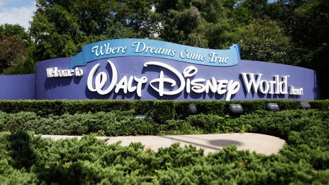A Disney World employee alerted police to a woman in a domestic violence situation after she called inquiring about tickets.