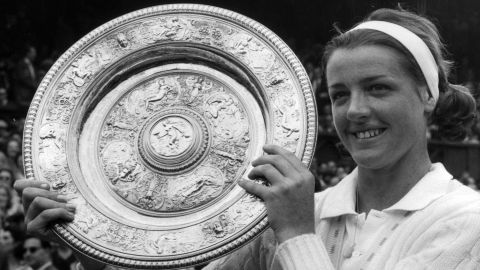 Smith, the Ladies Wimbledon Champion for 1963, poses with the trophy after defeating Billie Jean Moffitt (Billie Jean King) in straight sets.