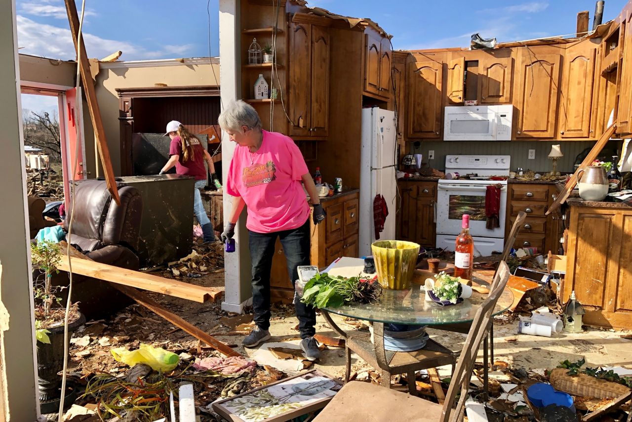 Patti Herring sobs as she sorts through the remains of her tornado-ravaged home in Fultondale, Alabama, on Tuesday, January 26. <a href="https://www.cnn.com/2021/01/26/weather/alabama-tornado-tuesday/index.html" target="_blank">A large tornado</a> annihilated parts of Jefferson County, killing at least one person and injuring dozens.