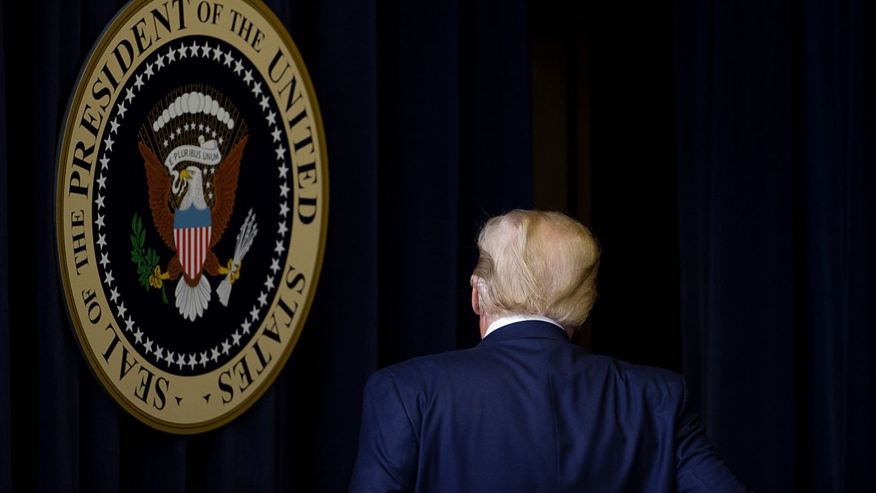 President Donald Trump walks out after speaking at the Operation Warp Speed Vaccine Summit on December 8, 2020, in Washington, DC. 